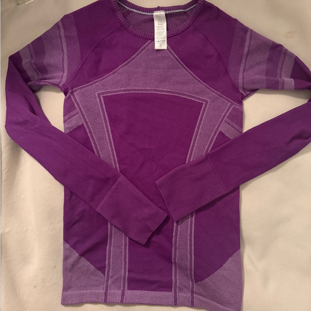 Lvivva by Lululemon Girls Purple Fly Tech long-sleeve shirt.
